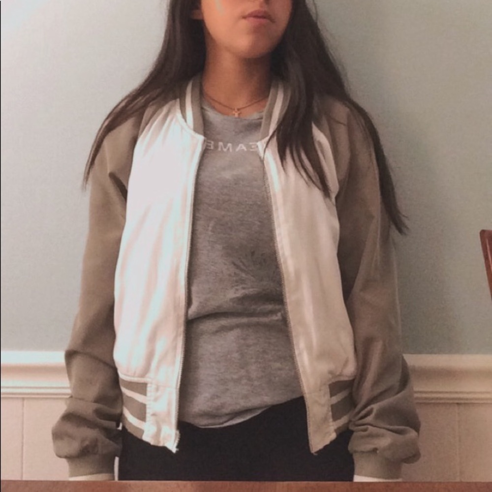 green and white bomber jacket